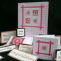 OCCASIONI VARIE €1.40 - quadratini rosa