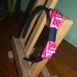 Cerchietto nero con fiocco fucsia 