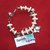 Bracciale di perle bianche e charms