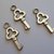 12 charms chiave chiavi piccole argento tibetano
