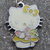 Hello Kitty ocra con mazzo di fiori 