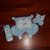 kit ippo: porta pigiama, porta biberon e peluche sonoro