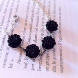 BRACCIALE CON ROSE IN RESINA  COLOR NERO