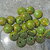 5 perle verde in pietra sintetica effetto granito