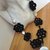 collana fiori neri all'uncinetto