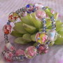 Bracciale in filo armonico " Fiori in perle"