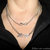 collana simbolo Iinfinito e scritta lovie argento tibetano