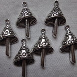 6 funghetti in argento tibetano 30x17 mm.