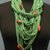 Collana fettuccia verde con pietre rosse