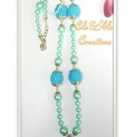 COLLANA CON PERLE RIVESTITE ALL'UNCINETTO, COLORE TURCHESE