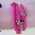Bracciale rosa con charms 