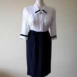 Elegant white and dark blue 1980s summery vintage polyester secretary dress.