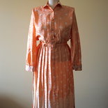 Shiny Orange 1980's vintage secretary polyester dress with White Oriental Flowers, Made in El Salvador, Excellent condition.