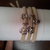 Bracciale in fettuccia di lycra  sabbia con charms