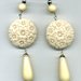 Orecchini color crema