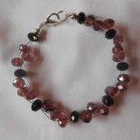 bracciale con svaroski viola e neri.