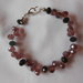 bracciale con svaroski viola e neri.