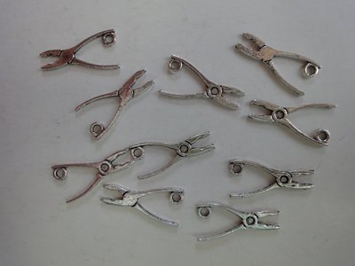 10 pinze in argento tibetano 10 pinze in argento tibetano