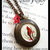 RED CARDINAL COPER LOCKET-CIONDOLO PORTAFOTO CON UCCELLINO
