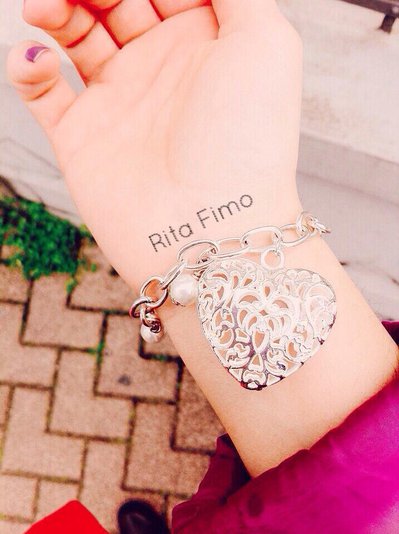 Bracciale con ciondolo cuore bombato con chiusura regolabile Bracciale con ciondolo cuore bombato con chiusura regolabile