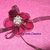 Spilla a fiore con petali in metacrilato e swarovski