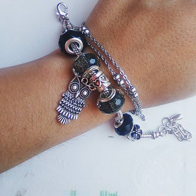 bracciale moda ciondoli assortiti tonalità nero con ciondolo gufo bracciale moda ciondoli assortiti tonalità nero con ciondolo gufo