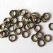100 Anellini bronzo diametro 3-7 mm