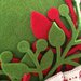 Svuotatatasche in feltro e decorazioni in panno in versione natalizia