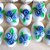 Confetti decorati con 3 roselline tonalità azzurro