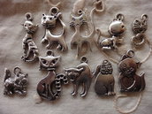 10 Gattini in Metallo color argento di diversi modelli