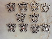 10 Farfalle in Metallo color argento 16x15 mm.