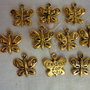 10 Farfalle in Metallo color oro 13x13 mm.