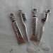 4 Ciondoli Spazzolino e Dentifricio in Metallo color argento 28 e 30mm.