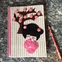 Quaderno con copertina decorata con kekeshi e fiori