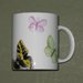 Tazza mug con farfalle
