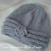 Cappello bambina a turbante con fiore in pura lana 100%