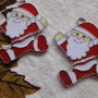 2 Babbo Natale in smalto 40x33 mm.