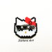 Spilla "Hello Kitty" realizzata con perline Miyuki delica