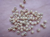 100 Perle di legno avorio 5x4 mm.