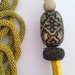 Long necklace mustard-colored tassel brown