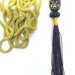 Long necklace mustard-colored tassel brown