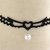 Collarino ali d'angelo con cuore e perlaCollarino choker tessuto