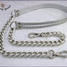 Tracolla per borsa lunga cm. 85 - doppia similpelle argento con glitter, catena e moschettoni argento 