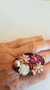 Anello  ovale con fiori e rosellina 
