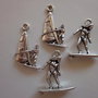 4 Ciondoli Surfista 2 modelli in metallo color argento 
