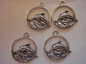 4 Ciondoli Delfino in metallo color argento 30x27mm.