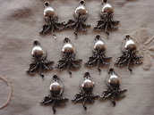 10 Ciondoli Seppie in metallo color argento 21x15mm.