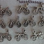 10 Ciondoli Bici in metallo color argento 16x14mm.