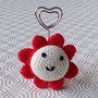 Portafoto con margherita kawaii rossa amigurumi fatta a mano all'uncinetto