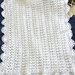 Copertina per carrozzina o culla in morbida lana baby lavorata a mano 